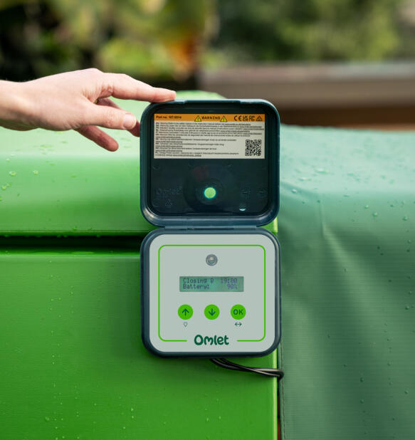 close up of the omlet smart automatic chicken coop door control panel